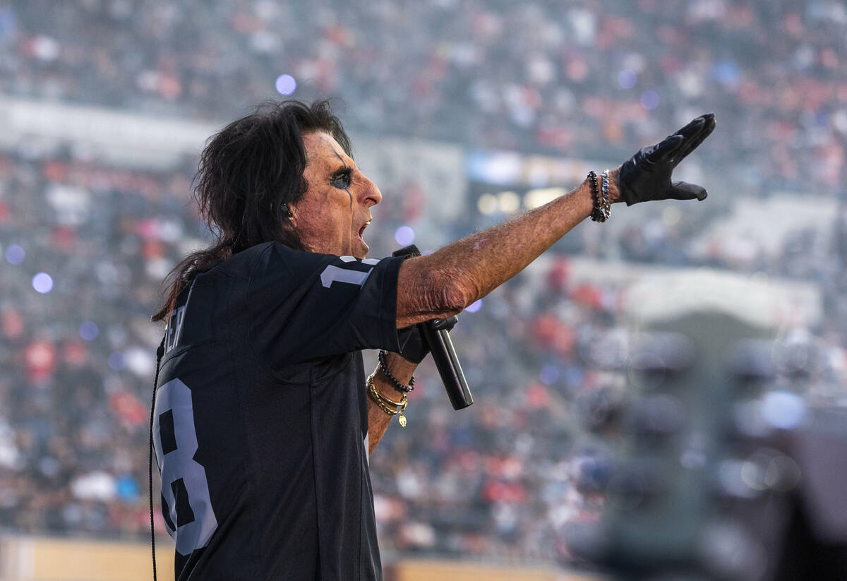 Alice Cooper performs during the halftime show at the Raiders NFL game at Allegiant Stadium on ...