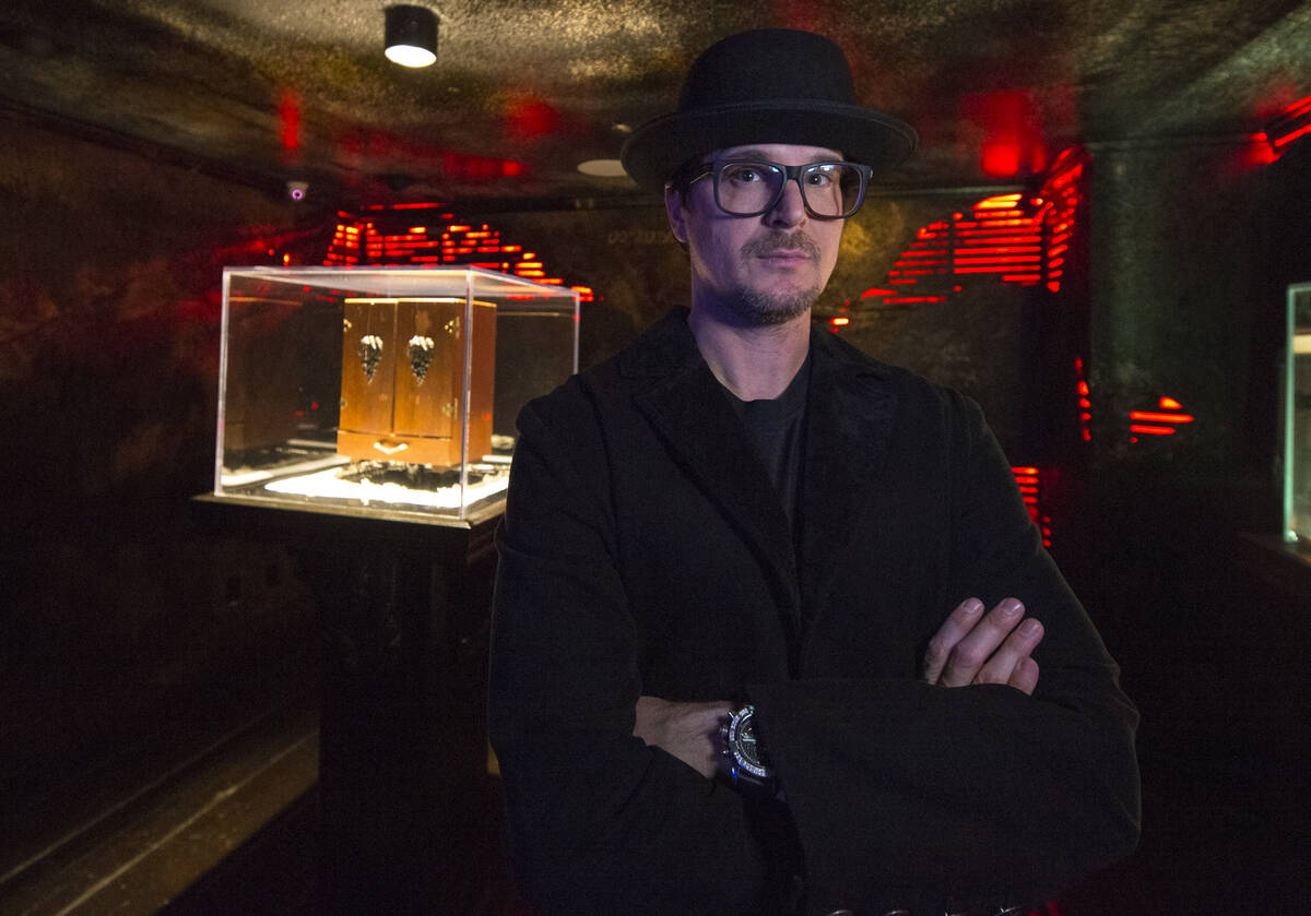 Ghost hunter Zak Bagans poses with his Dybbuk Box at Zak Bagans' The Haunted Museum located at ...