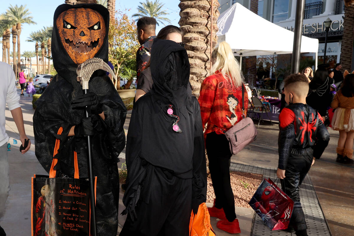 Isaiah, 11, left, and Isaac Scott, 10, of North Las Vegas during the Halloween Ghost Walk at Th ...