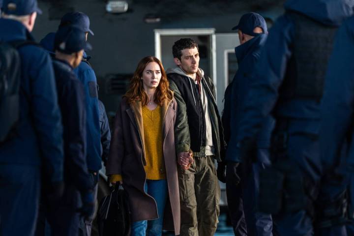 This image released by Universal Pictures shows Emily Blunt, left, and Josh O'Connor in a ...