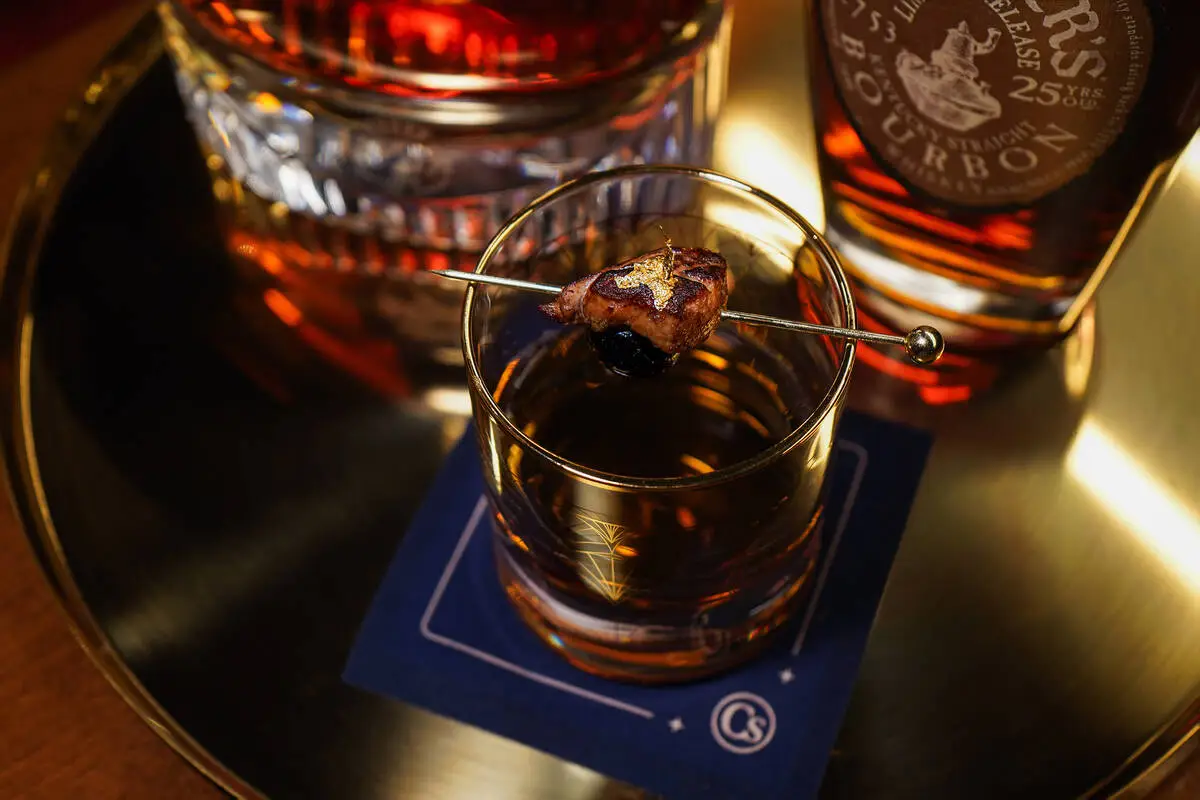 The Master cocktail, offered as part off the $20,000 Fade to Grand package at Carversteak in Re ...